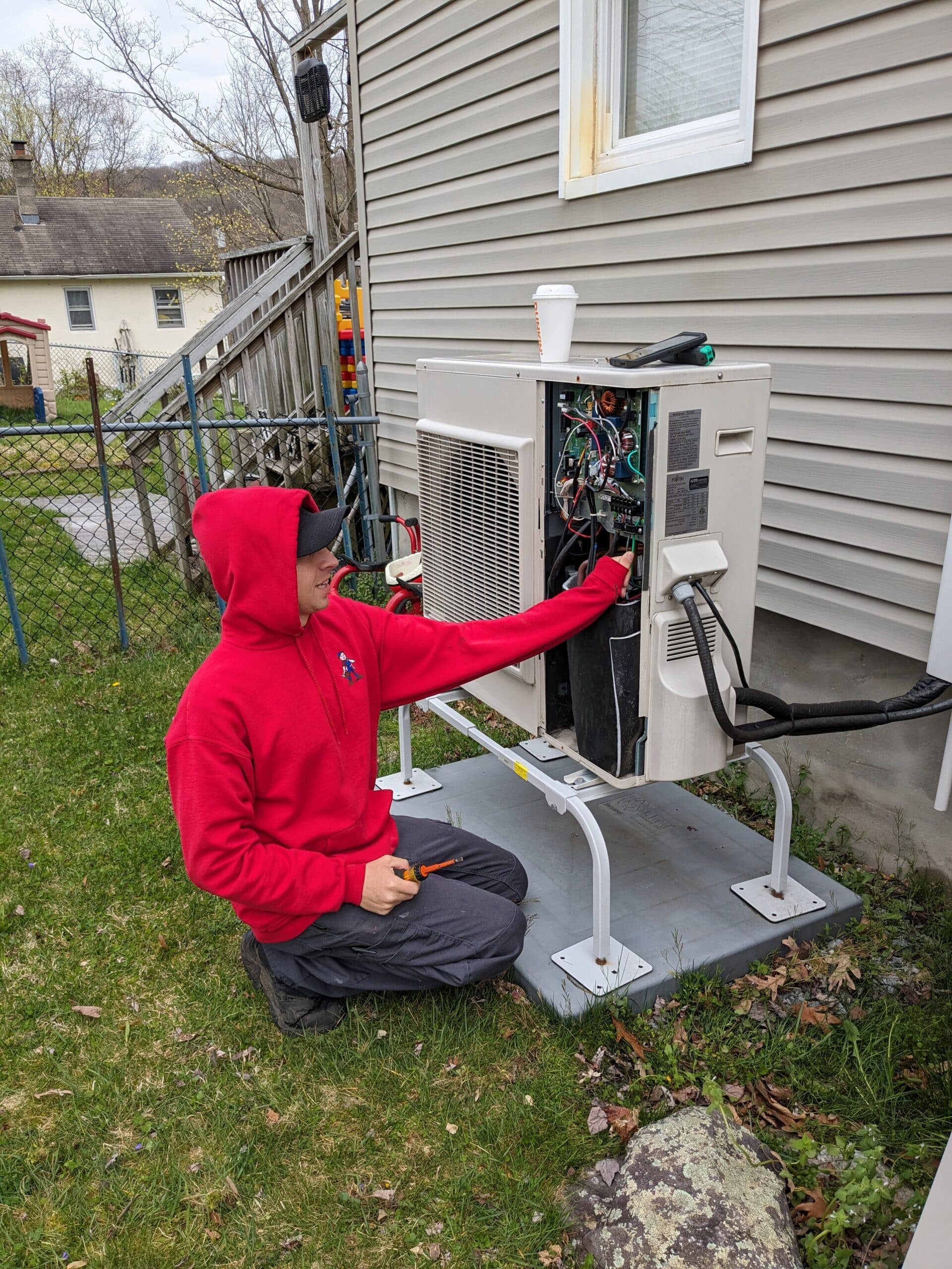 Outside AC maintenance in West Milford, New Jersey