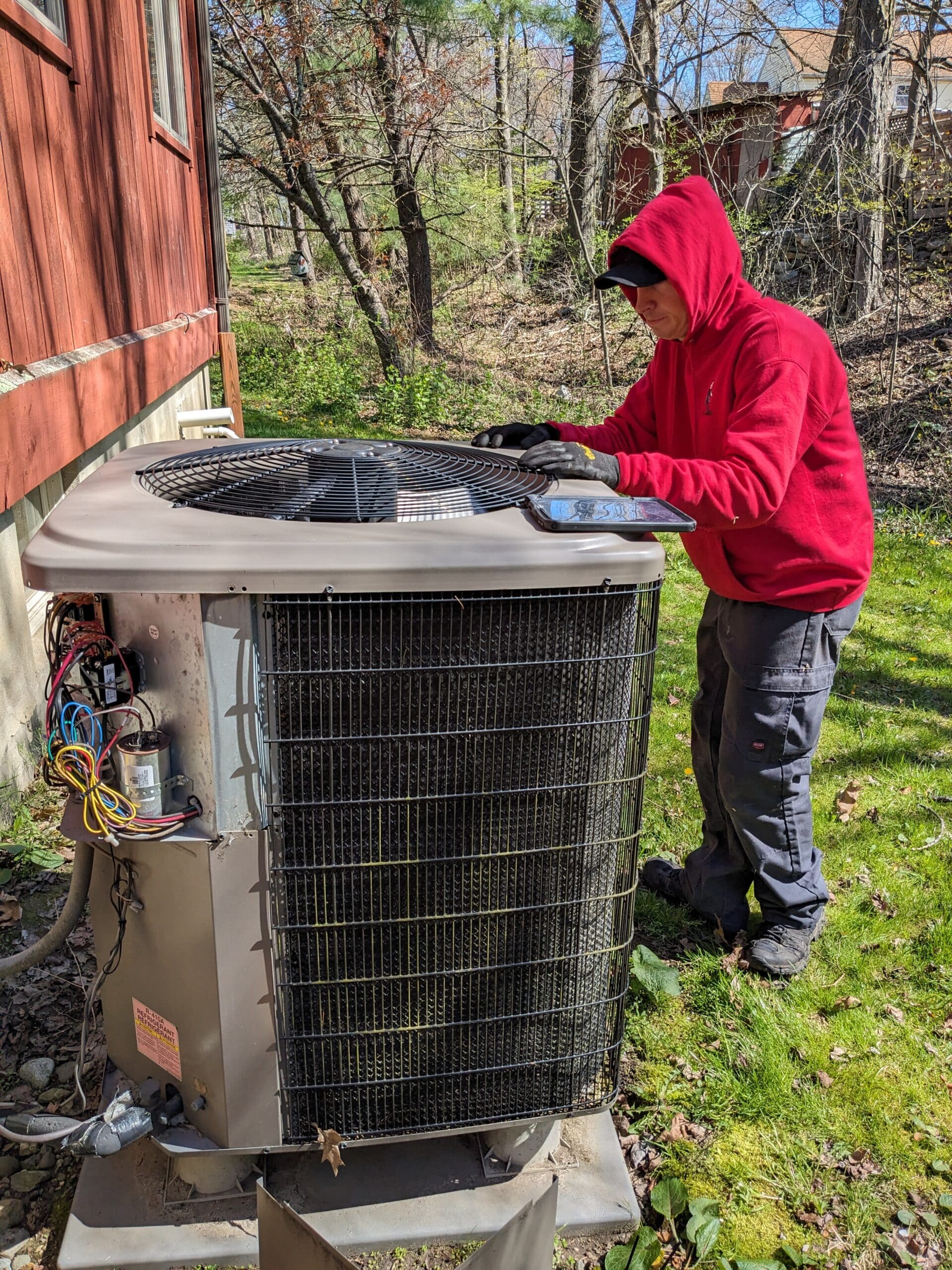 Outside AC maintenance in West Milford, New Jersey