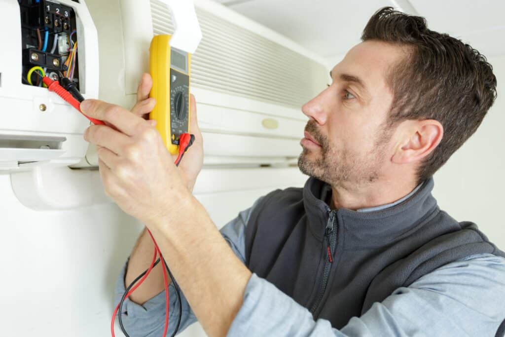 west milford hvac tech testing air conditioner