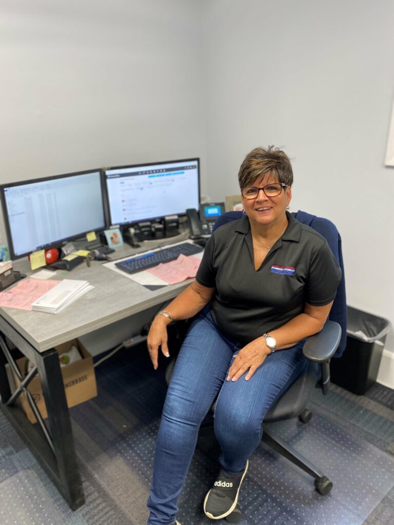 MLPH august employee spotlight roxanne working at her desk