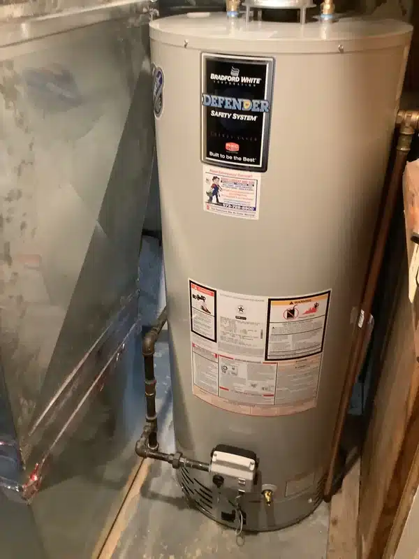 Bradford White Defender gas water heater installed in a West Milford, NJ basement by Mark Lindsay and Son