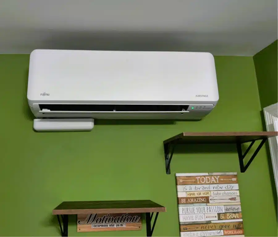 Wall-mounted Fujitsu Airstage ductless mini-split cooling a green home office in West Milford, NJ home