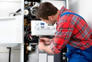 technician repairing furnace in west milford nj