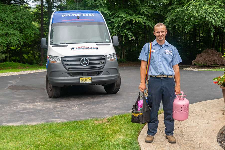 https://www.marklindsayplumbing.com/wp-content/uploads/tech_walking_house2.jpg