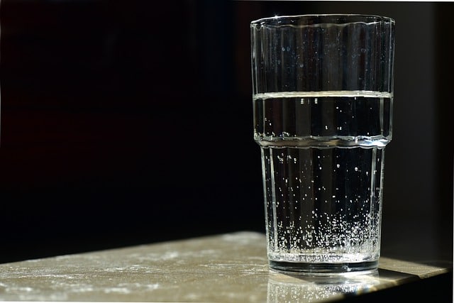 glass of filtered water sitting on counter